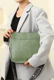 OVAL SHAPE CROSS MESSENGER BAG