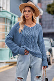 WOMEN LOOSE FIT ROUND NECK RIBBED KNIT SWEATER