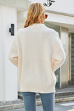 WOMEN OVERSIZED TWIST CABLE KNITTED SWEATER